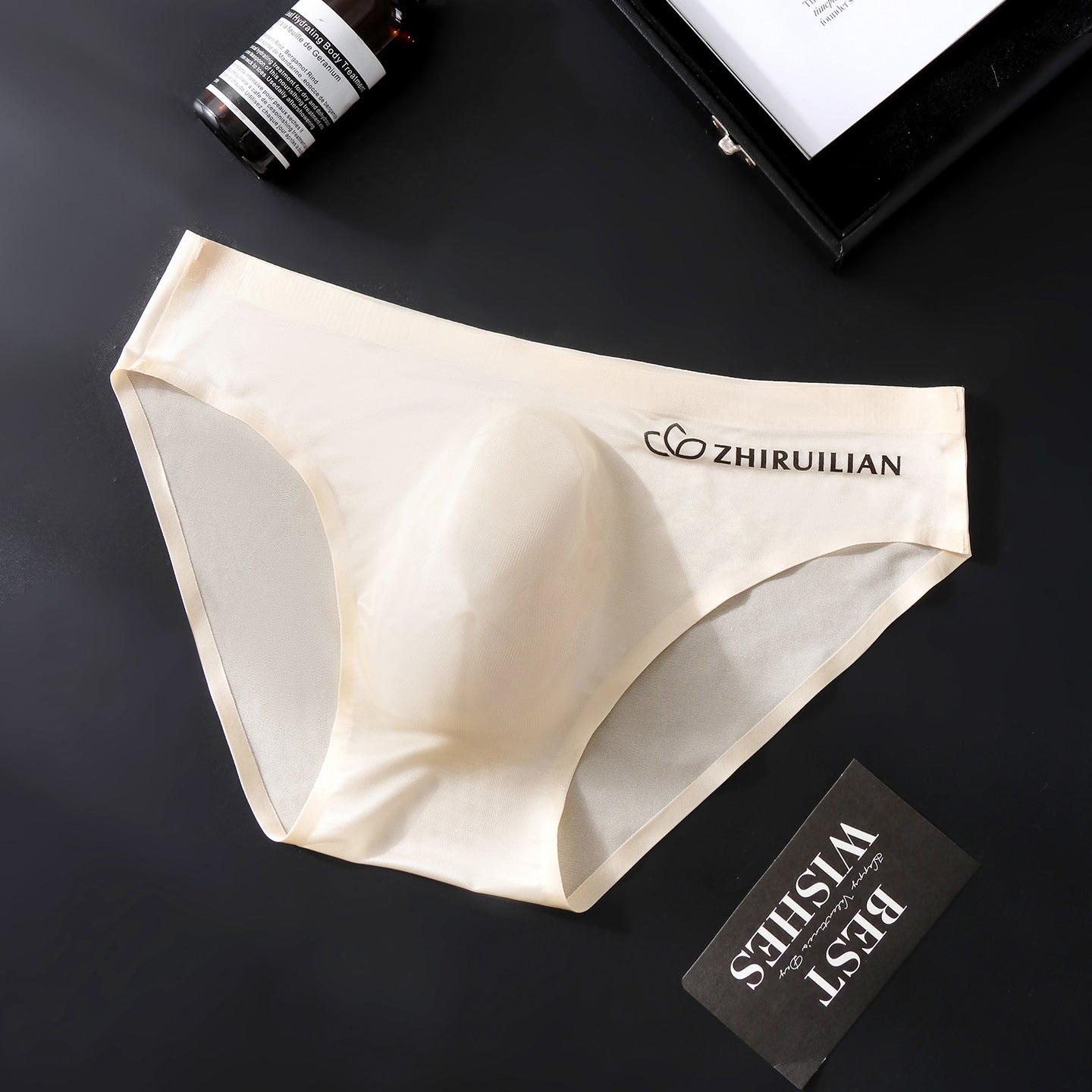 Foreign trade explosions men's briefs breathable comfortable letter sports sexy transparent egg ice silk low waist underwear head